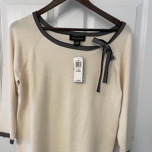 Women’s xl white with black and white bow.